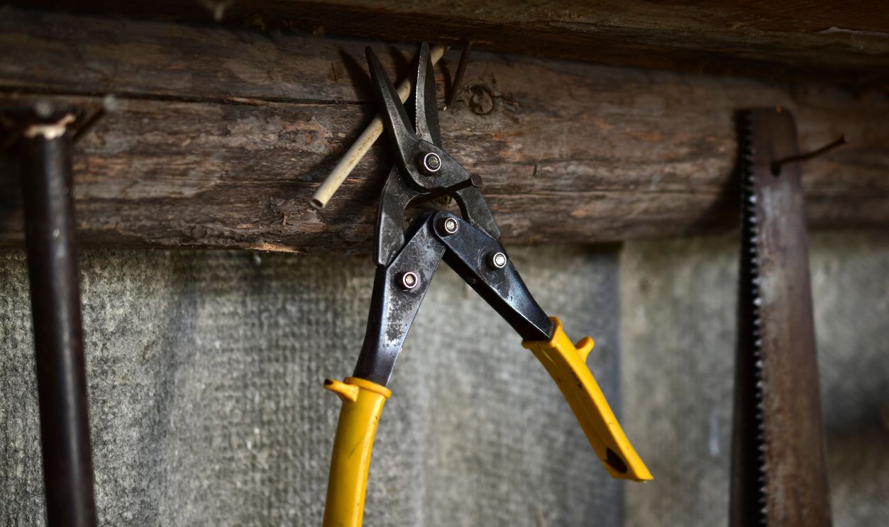 Tools and scissors for metal in the garage - stock photo Tools and scissors for metal in the garage