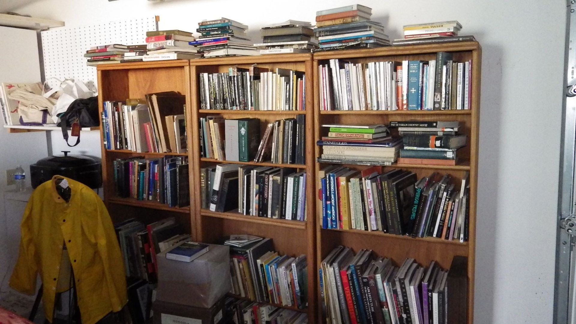 File:Book cases in garage.jpg