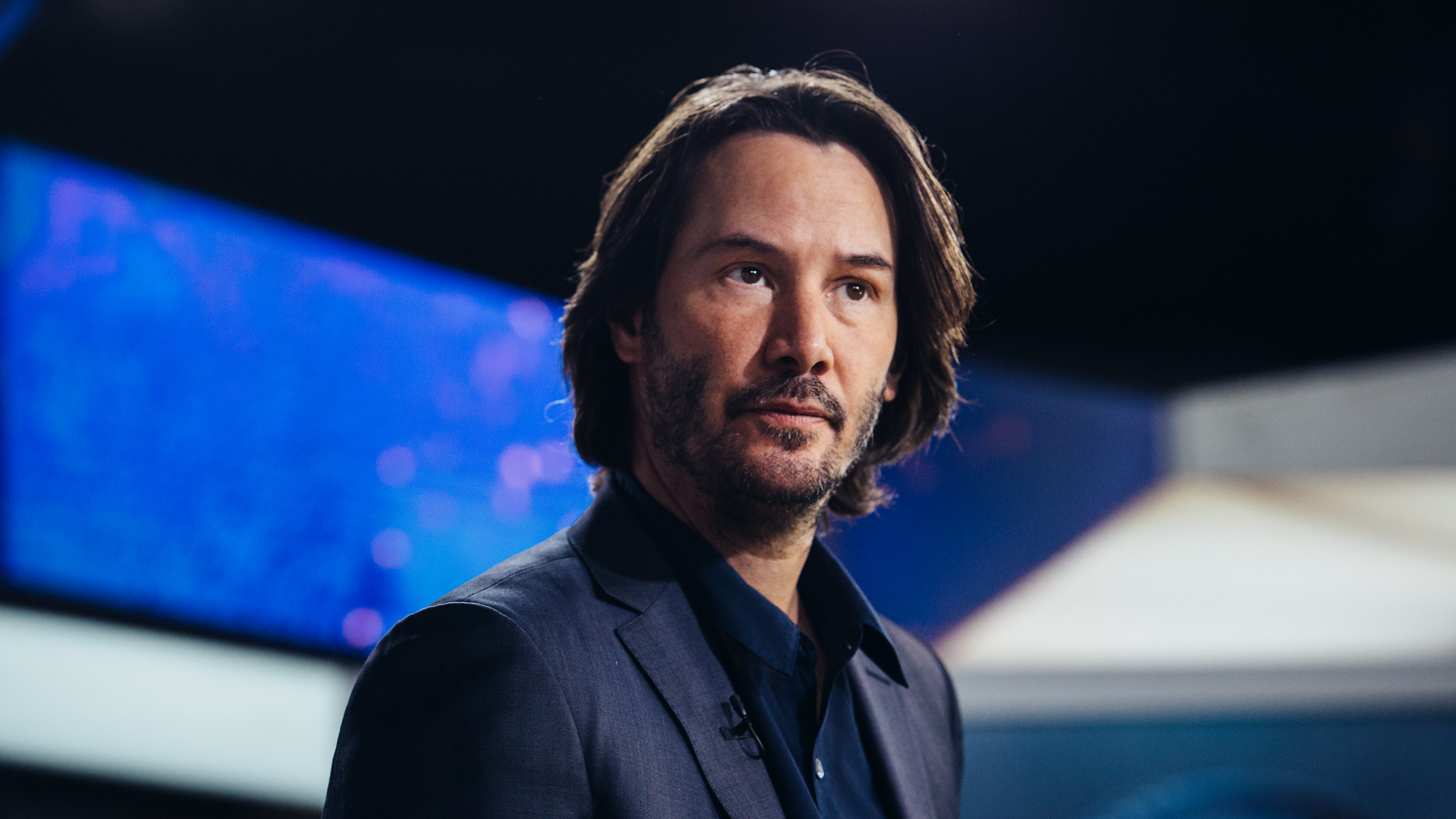 Keanu Reeves in blue suit
