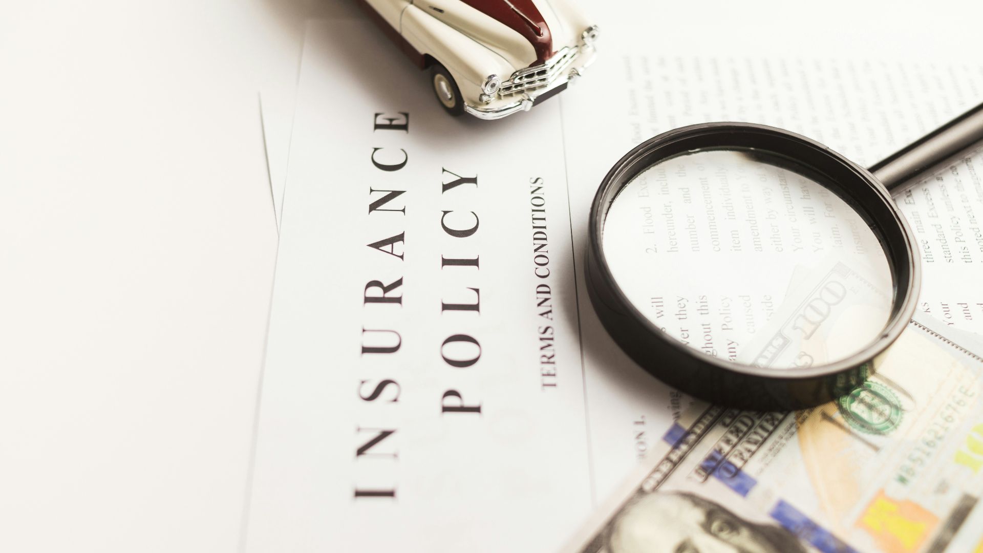 a magnifying glass sitting on top of a piece of paper