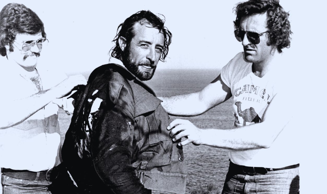 Gettyimages - 1078959602, Stunt man Grant Page, soaked in petrol, leaped over North Head ablaze today and survived. Page, completely enveloped in fire leapt from the cliff top and plummeted down a rope more than 100 metres long for a scene which was filmed as part of a series on