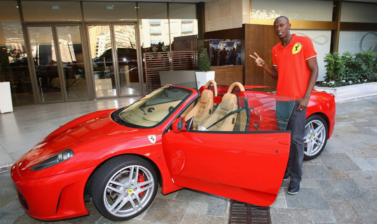 sain Bolt of Jamaica goes for a drive in a Ferrari in the streets of Monaco before the IAAF World Athletics Gala at the Hotel on November 23, 2008 in Monte Carlo, Monaco.