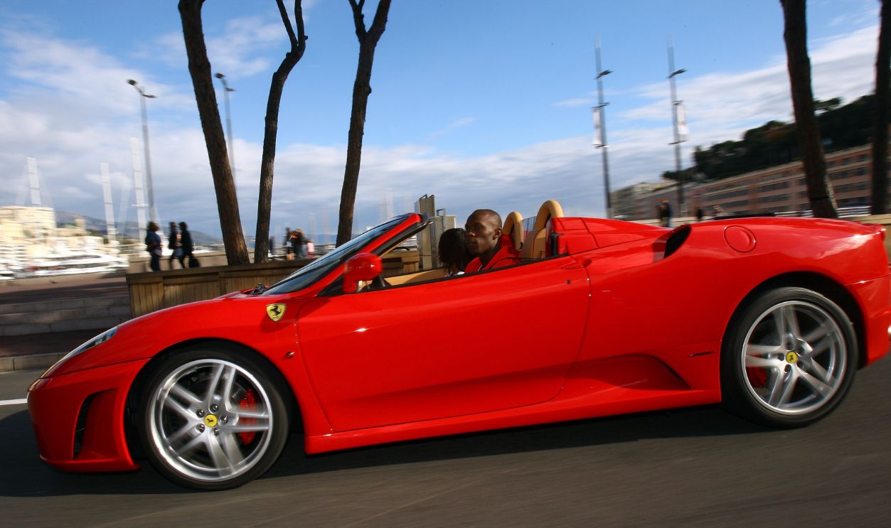 Usain Bolt of Jamaica goes for a drive in a Ferrari in the streets of Monaco before the IAAF World Athletics Gala at the Hotel on November 23, 2008 in Monte Carlo, Monaco. 