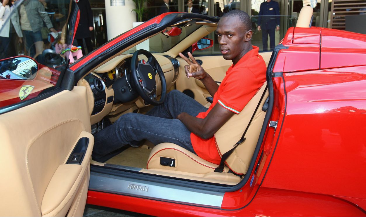 Usain Bolt of Jamaica goes for a drive in a Ferrari in the streets of Monaco before the IAAF World Athletics Gala at the Hotel on November 23, 2008 in Monte Carlo, Monaco. 