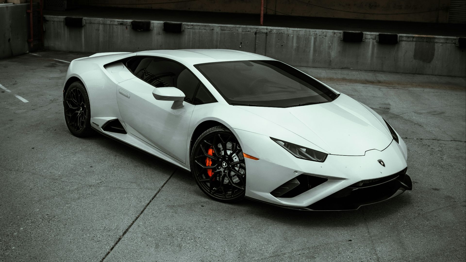 white porsche 911 parked in garage
