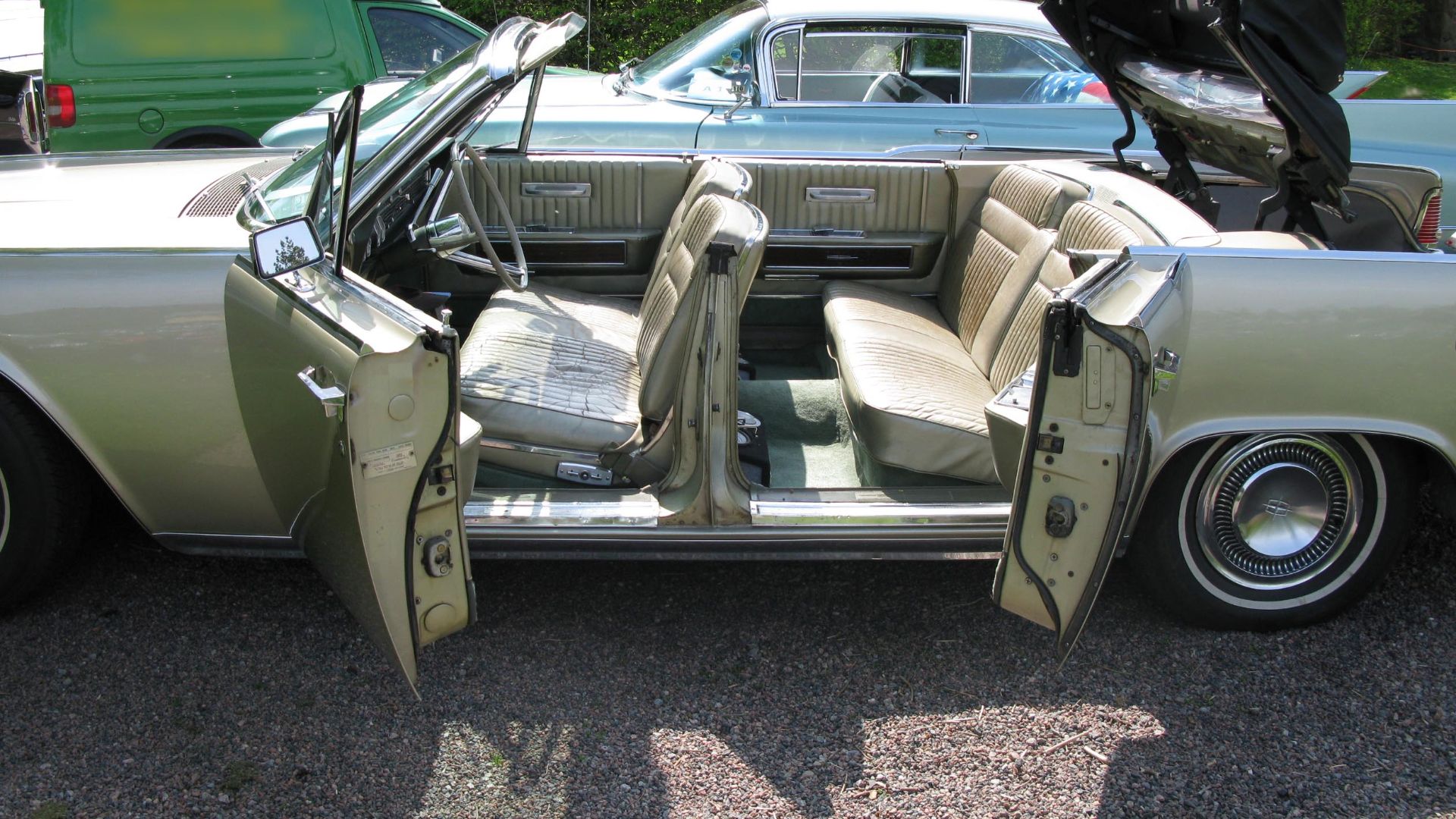 File:1960s Lincoln Continental convertible with suicide doors open.jpg