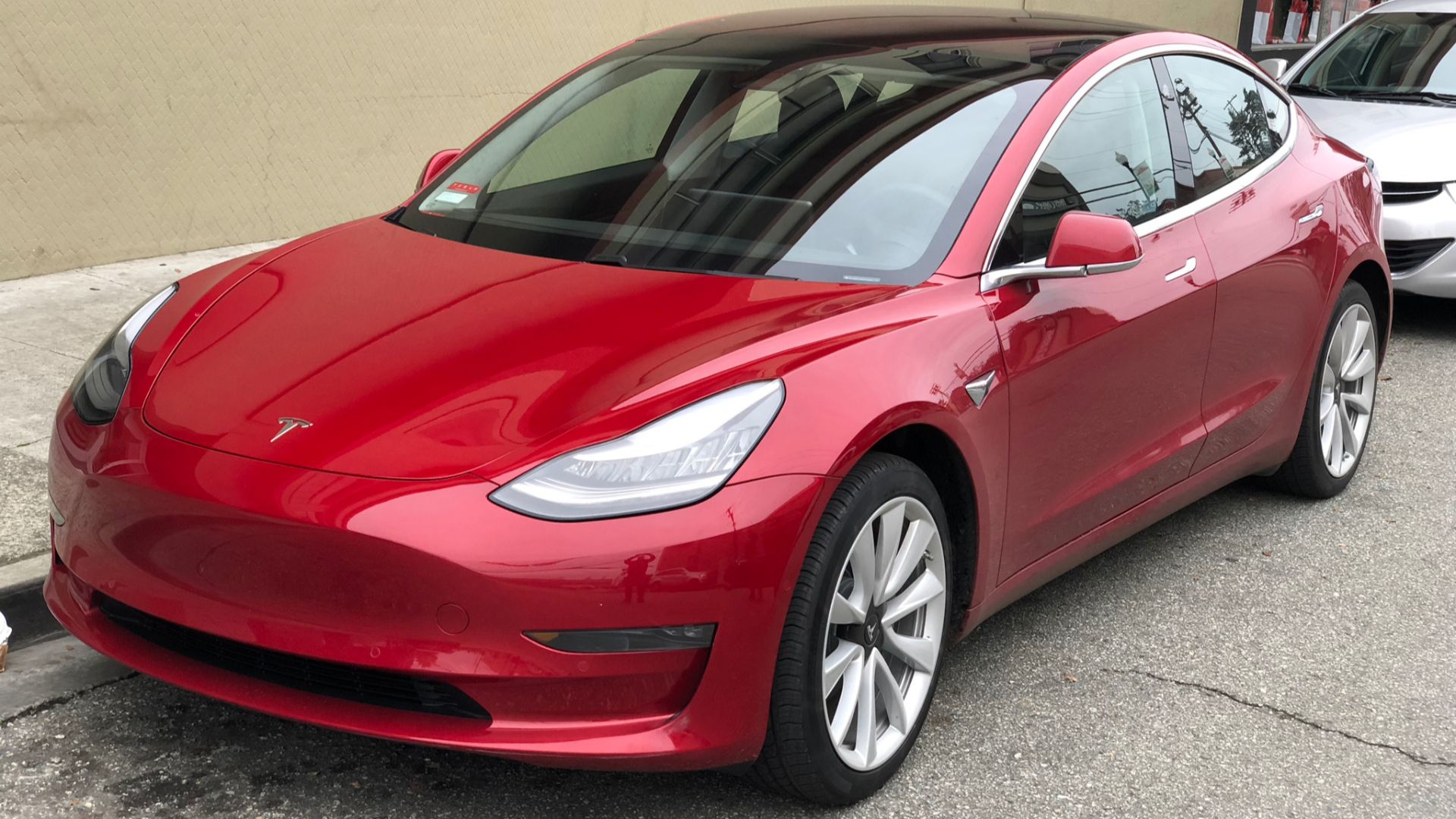File:Tesla Model 3 parked, front driver side.jpg