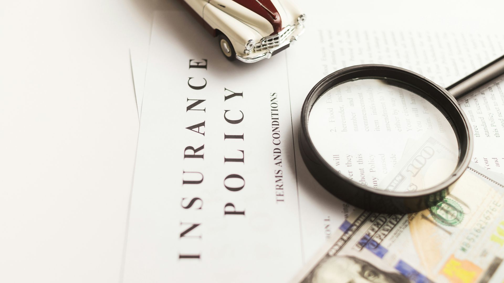 a magnifying glass sitting on top of a piece of paper