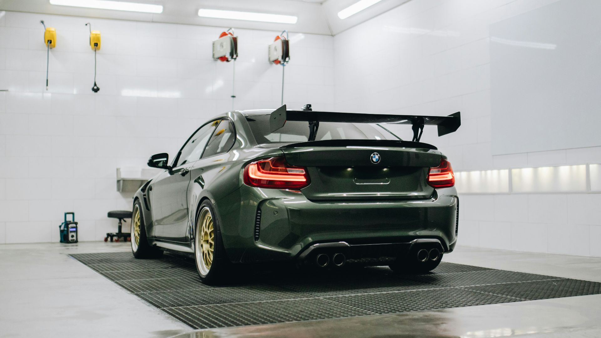 black porsche 911 parked in a parking lot