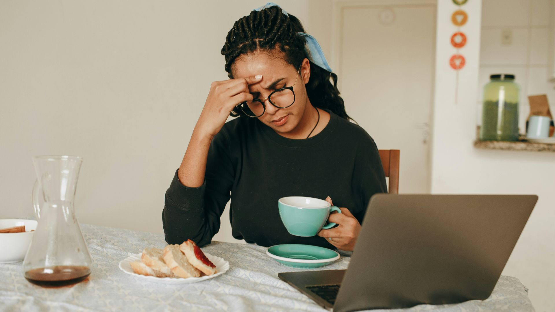 woman in black long sleeve shirt sitting on chair