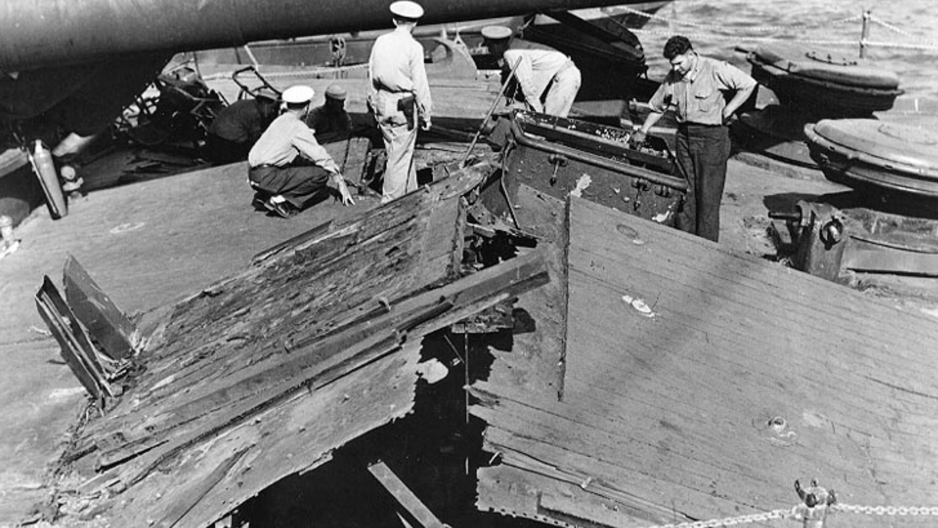File:USS Nevada damage to forecastle deck due to bomb blast'.jpg