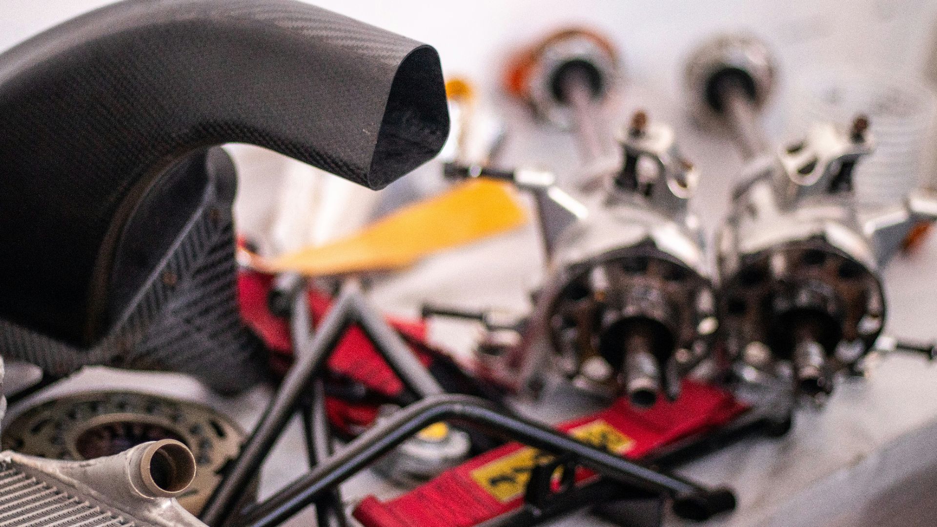 A close up of a car engine and parts