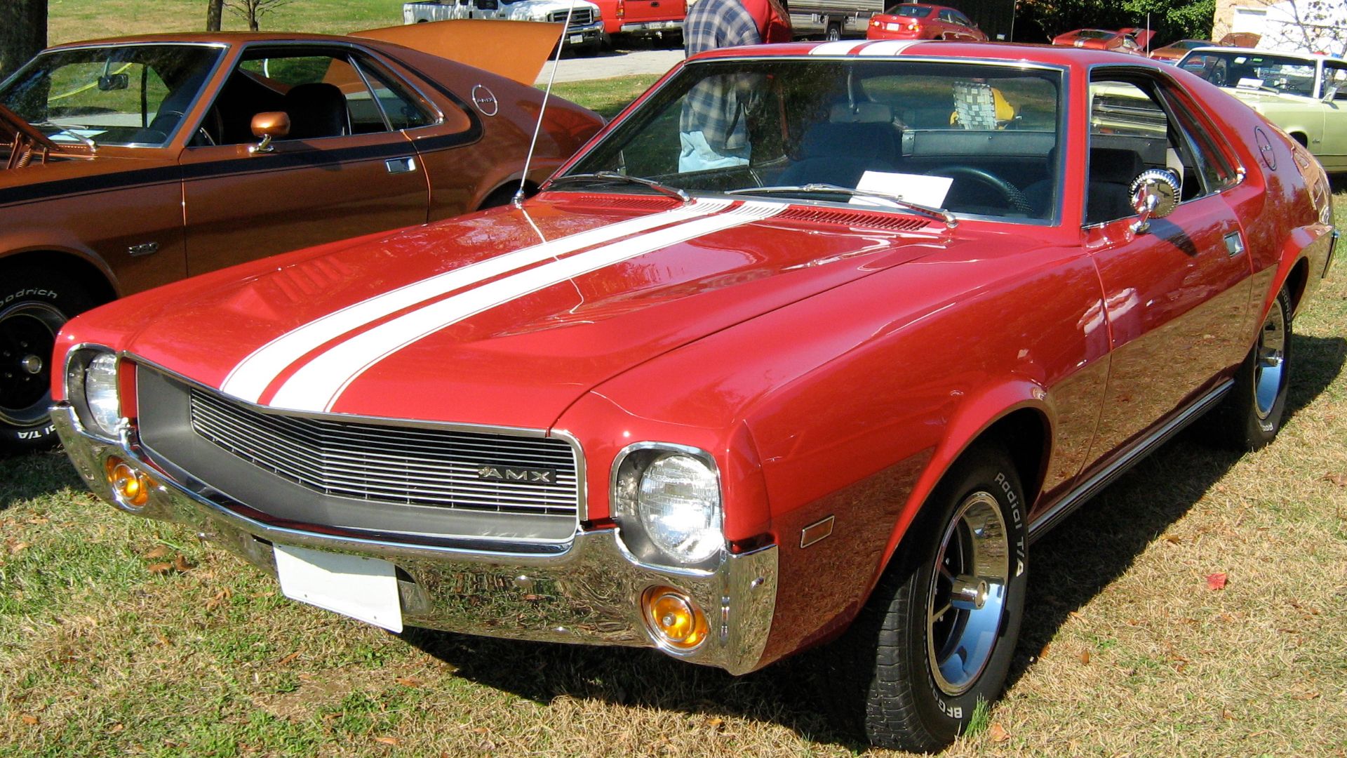 File:1969 AMC AMX red with white stripes.jpg