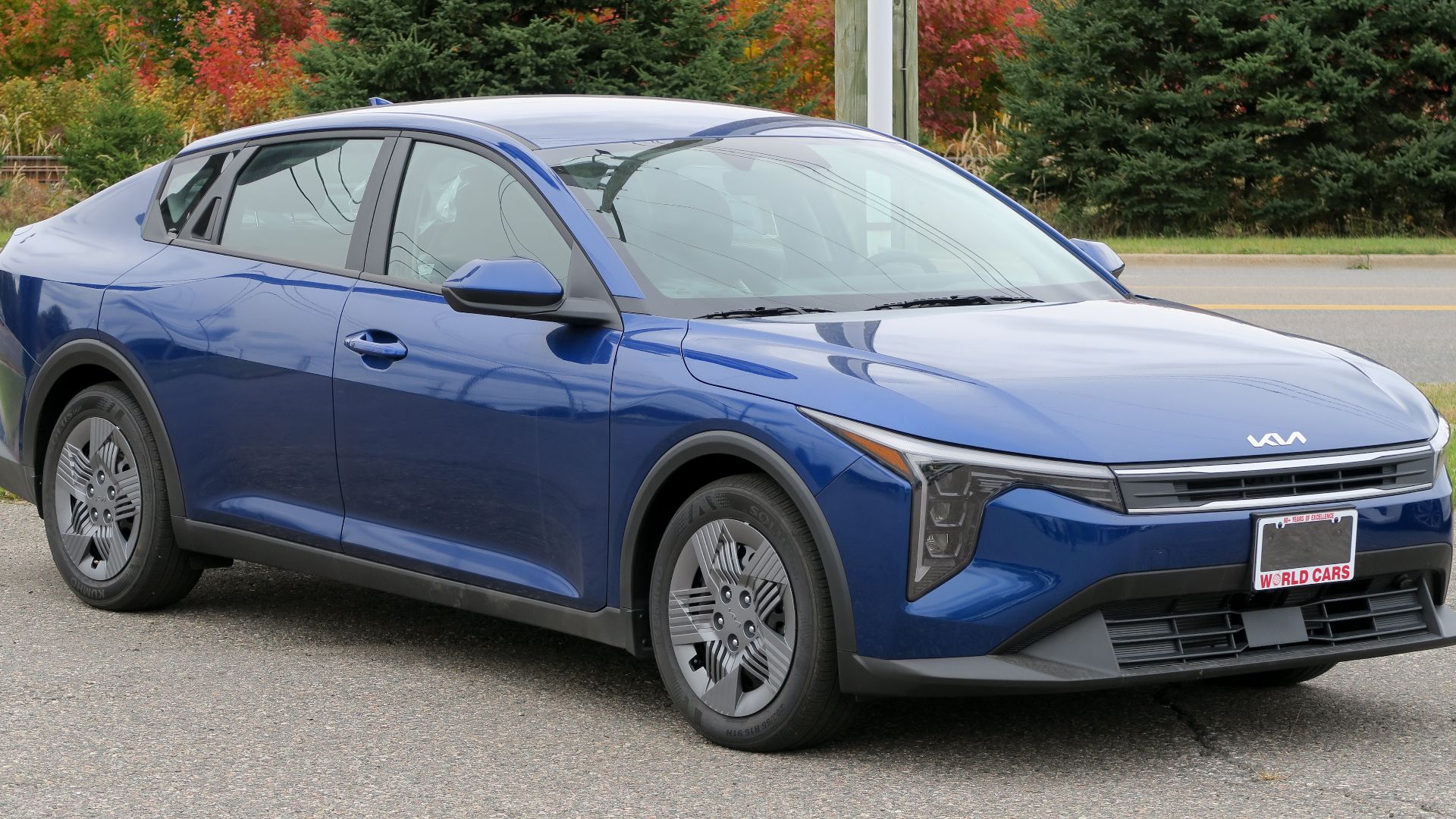 File:2025 Kia K4 LX in Azure Blue, front right, 2024-10-12.jpg