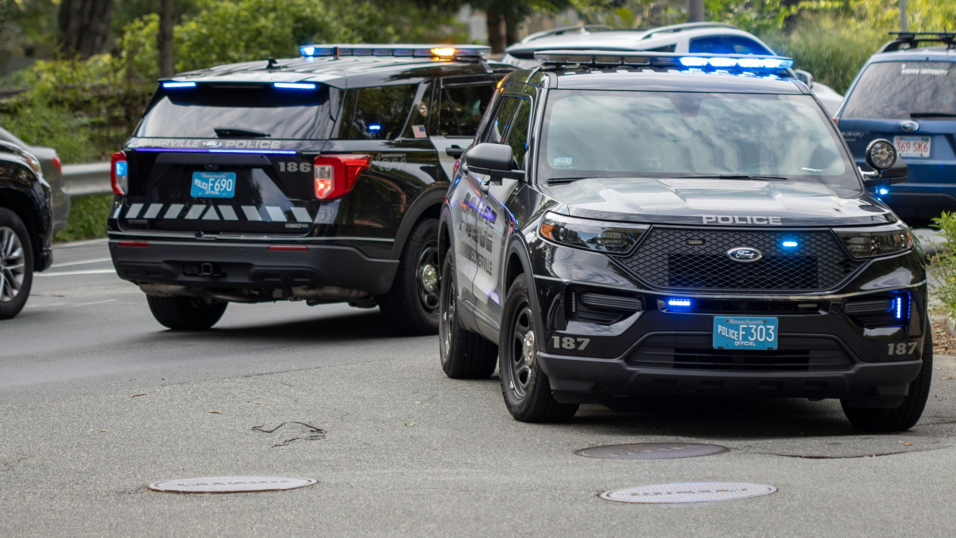 black mercedes benz suv on road during daytime