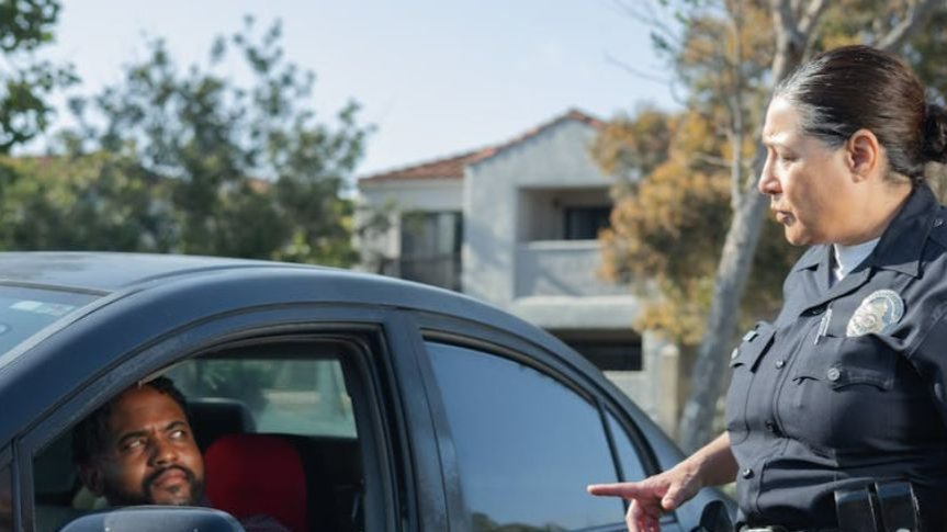 Policeman talking to a driver