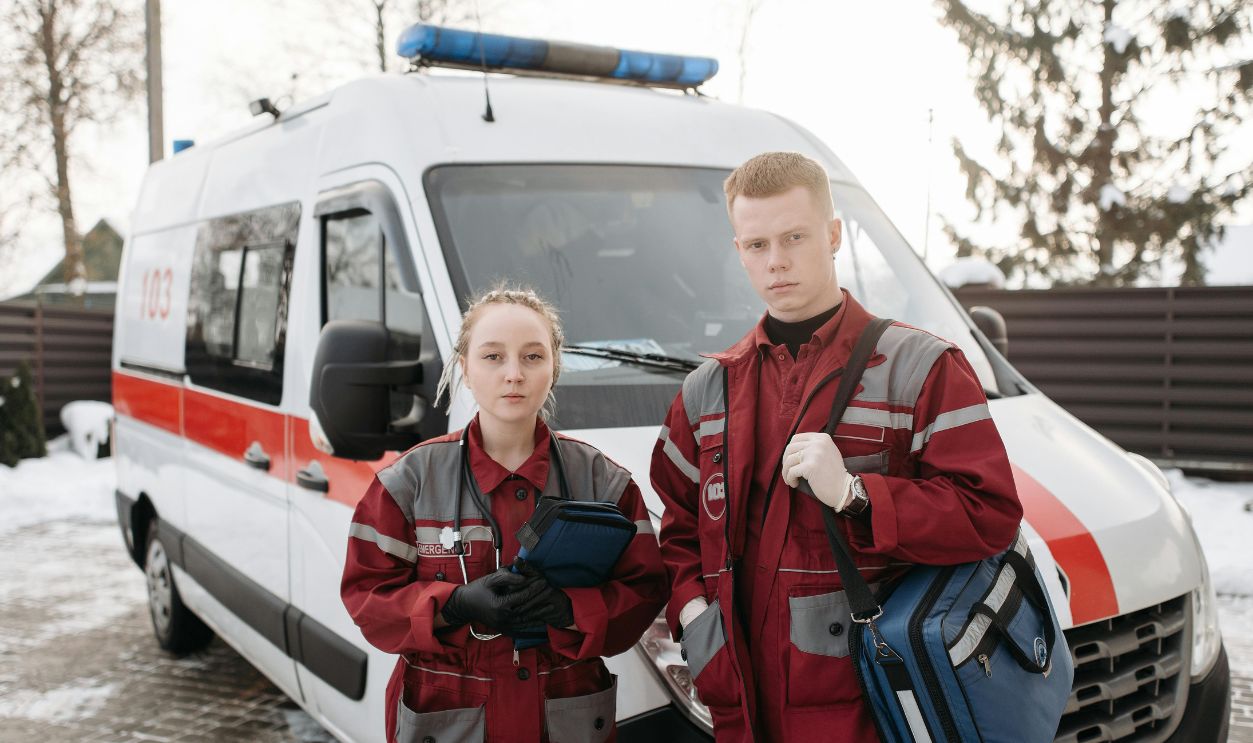 Paramedics Standing Near An Ambulance