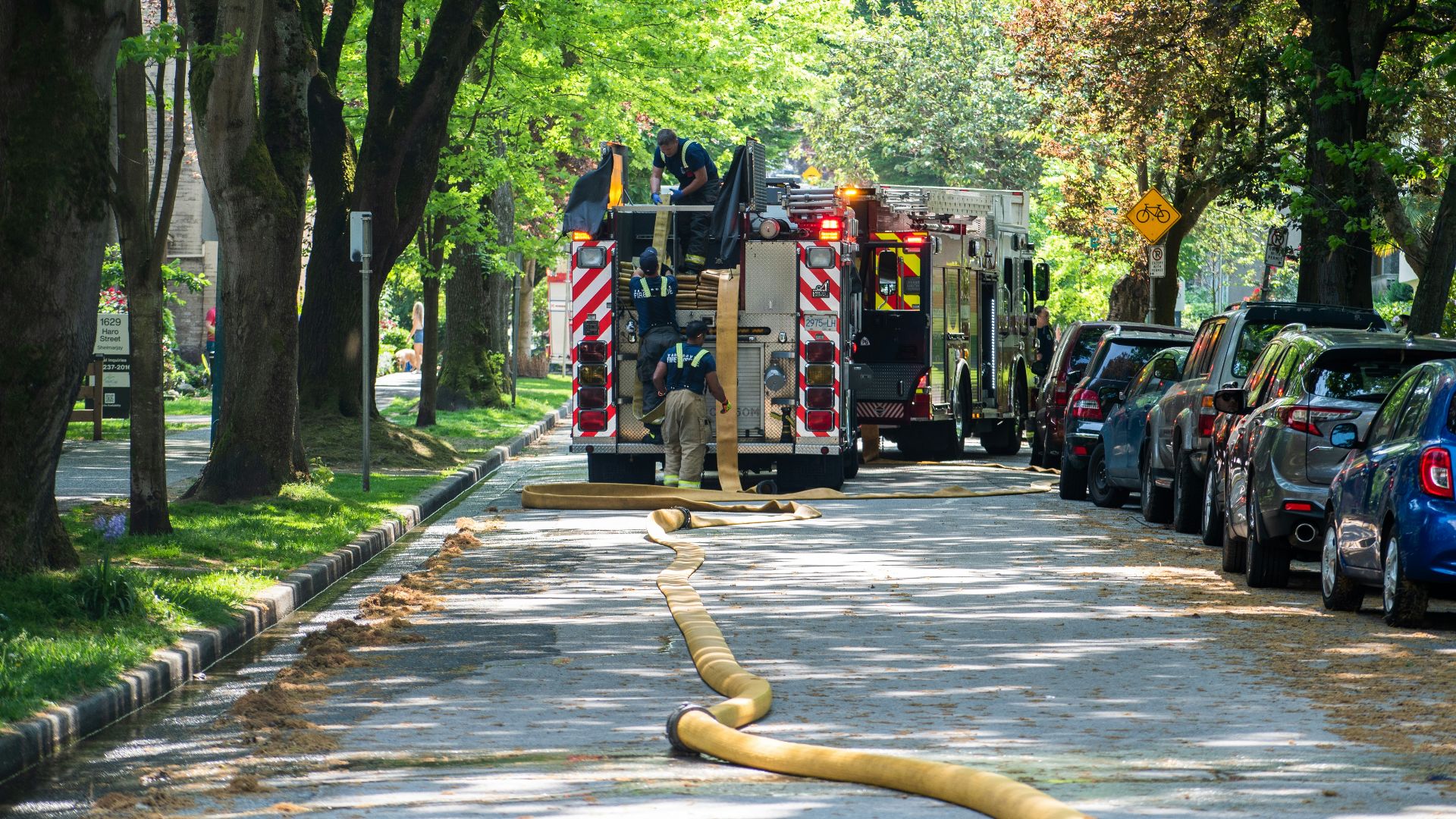 a fire truck parked on the side of a road