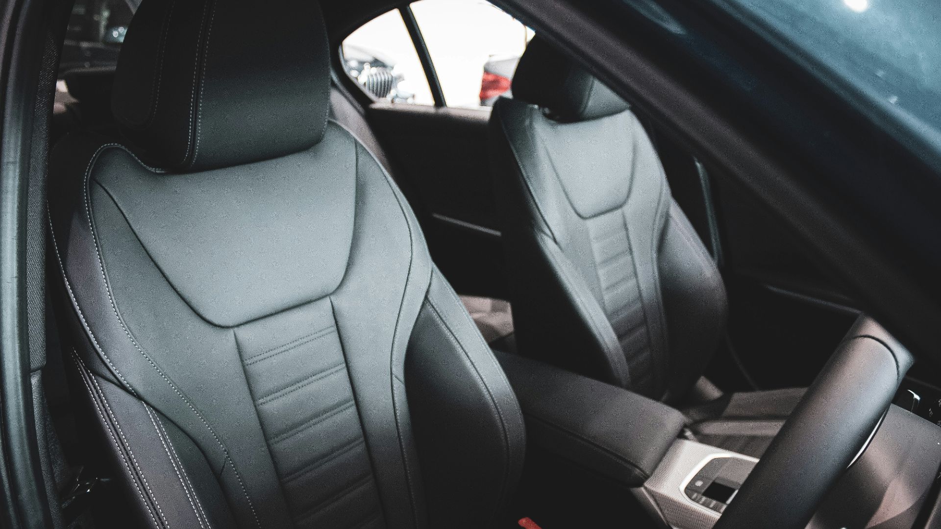 black leather car seat in car