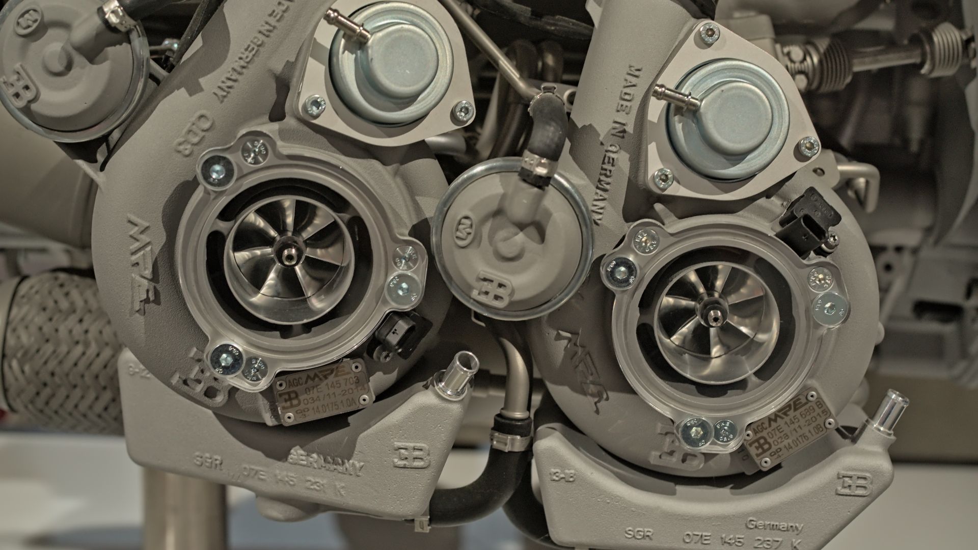 File:Twin Turbos on one side of a Bugatti W16 engine (53249394775).jpg