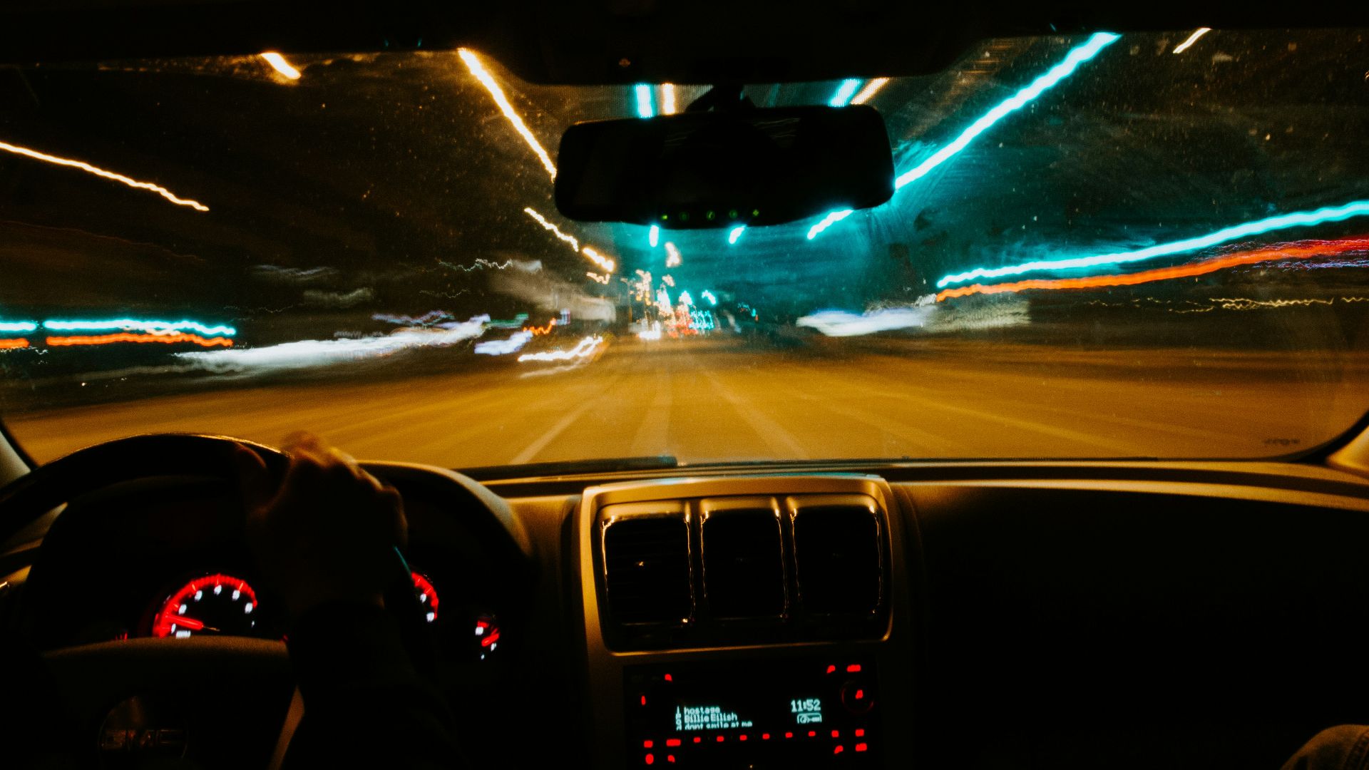 person driving car during night time