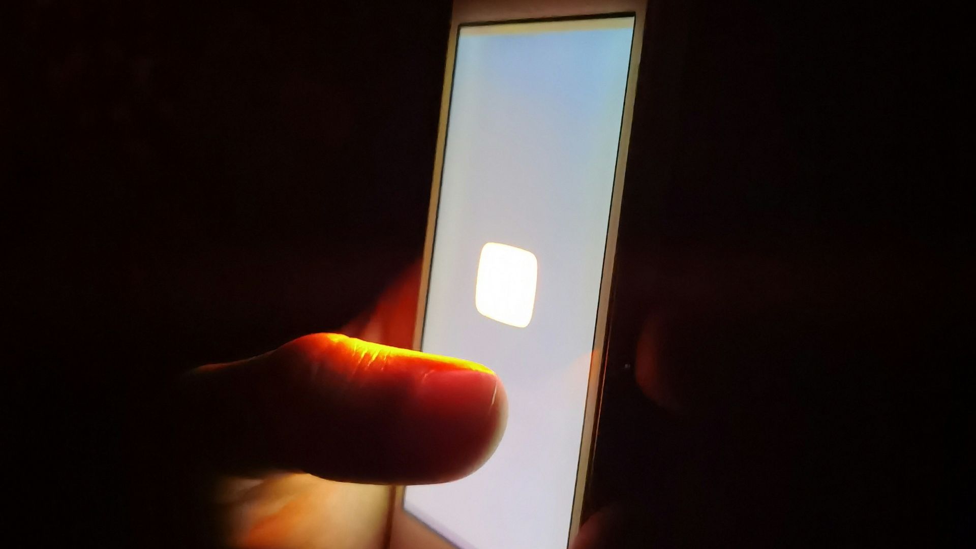 person holding silver iphone 6