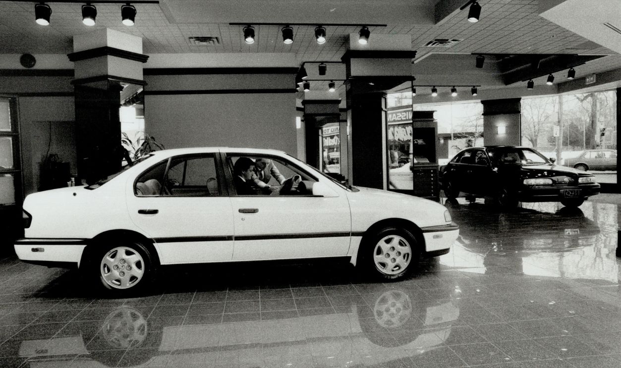 Rich Style: The gleaming Italian tile floor at infiniti of Yorkville is worth $40;000 alone. The room's trim and cabinets are custom-made of rich; burnished oak and teak. The walls are covered in textured blue-gray silk; the celing is tiered.