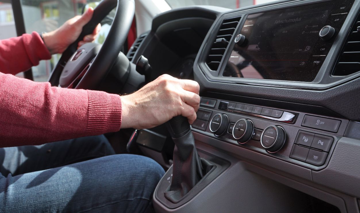 Driving school - Class C1 with light truck 24 April 2025, Mecklenburg-Western Pomerania, Rostock: The managing director and head of the Wunderlich driving school sits in a MAN TGE, which is used for training for the C1 driving license. With this driving license category, motor vehicles with a permissible total weight of over 3.5 to 7.5 tons may be driven. According to a new EU driving license directive, holders of a B driving license will in future be able to drive motorhomes with a gross vehicle weight of up to 4.25 tons, provided they complete additional training or a test.