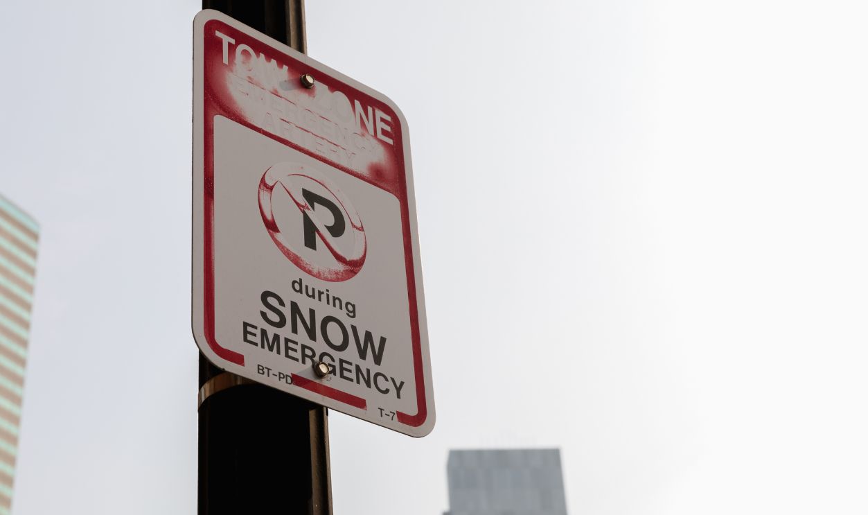 Signs No parking during snow emergency in Boston, USA.