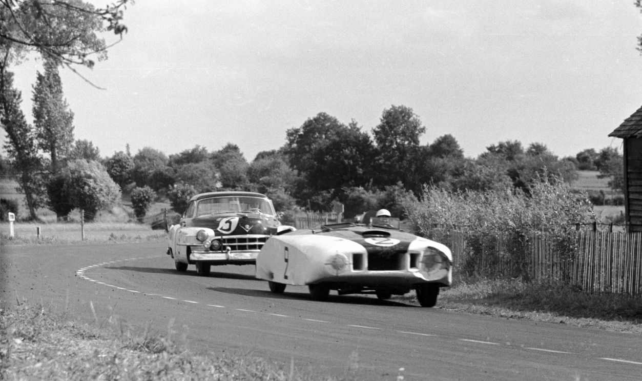 Briggs Cunningham's Cadillac special, Le Monstre, driven by Cunningham and Phil Walters, leads the other Cunningham team car, a Cadillac 61 driven by Sam and Miles Collier through White House corner during the 24 Hour Le Mans Race, June 1950. Le Monstre finished eleventh just behind the 61. 