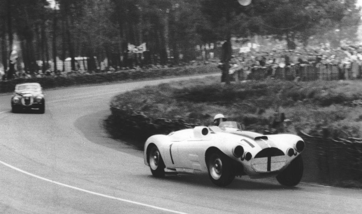 Briggs Cunningham, at the wheel of his Cunningham C4-R/Chrysler (No. 1), leads another competitor during the 24 Hours of Le Mans at Circuit del la Sarthe. Co-driving with Bill Spear, Cunningham finished the race in seventh position.