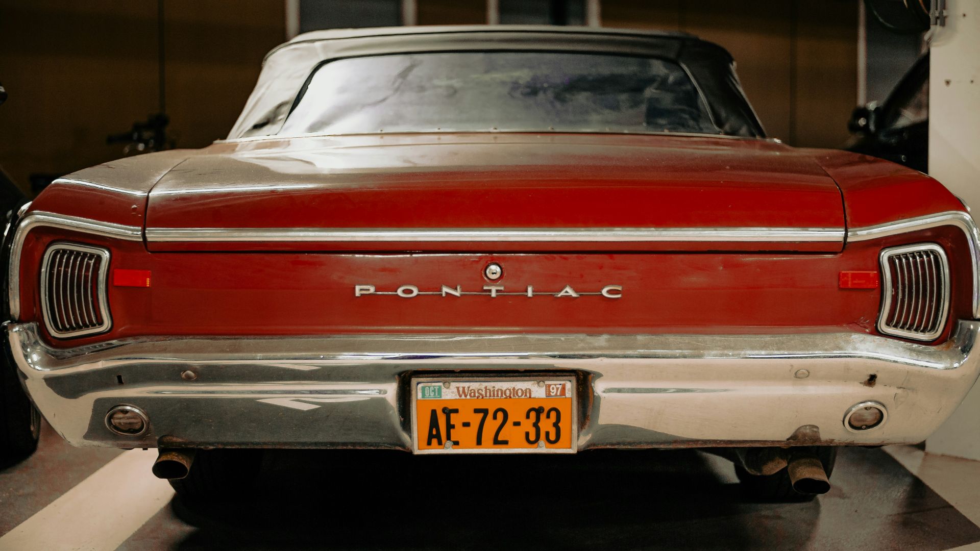 red and white chevrolet camaro