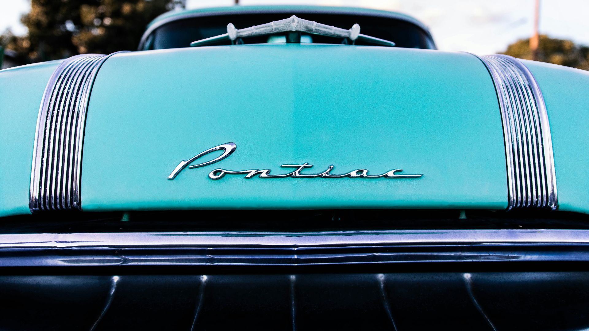 blue chevrolet camaro in close up photography