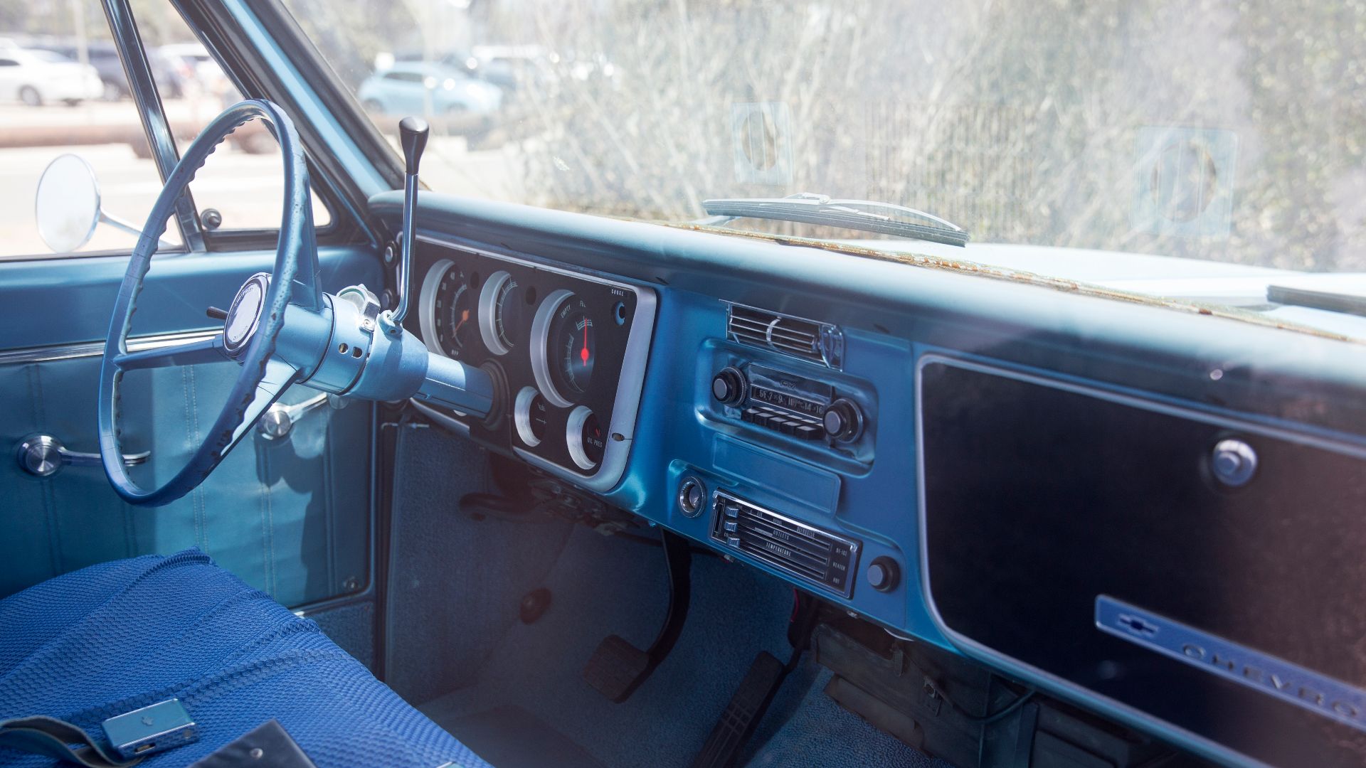 Dashboard and interior of a 1967 Chevrolet C10 Custom in Ventura, CA. Two-wheel drive with the fleetside long box. Nice shade,