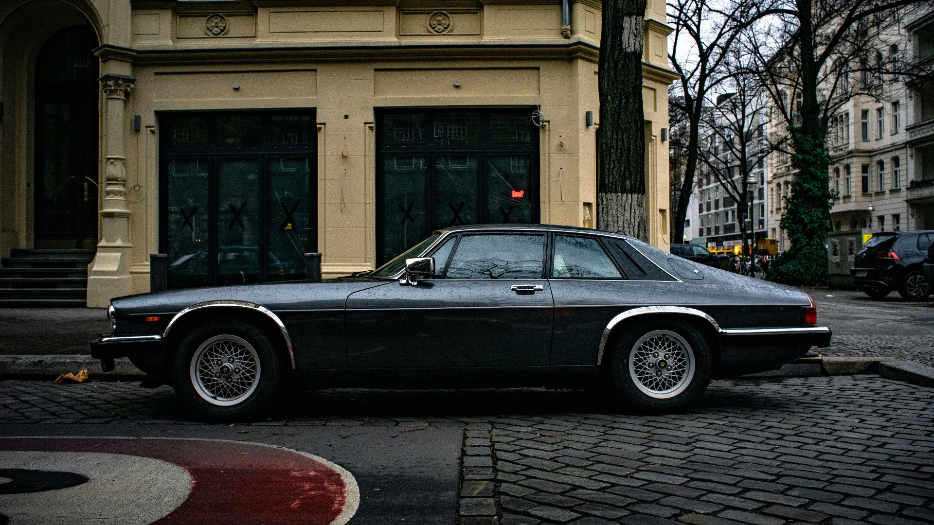 black coupe near bulding