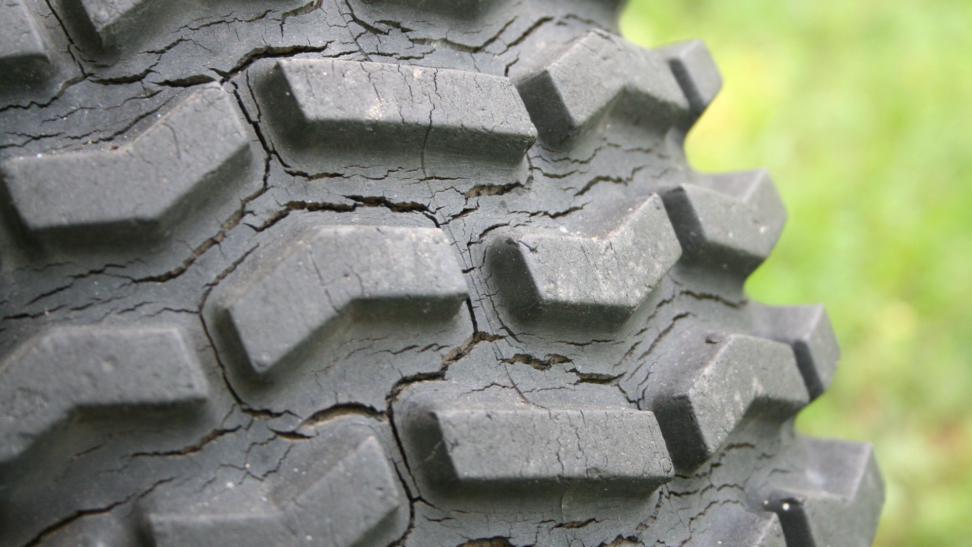 Tire showing weather-cracking over long-term exposure to the weather.