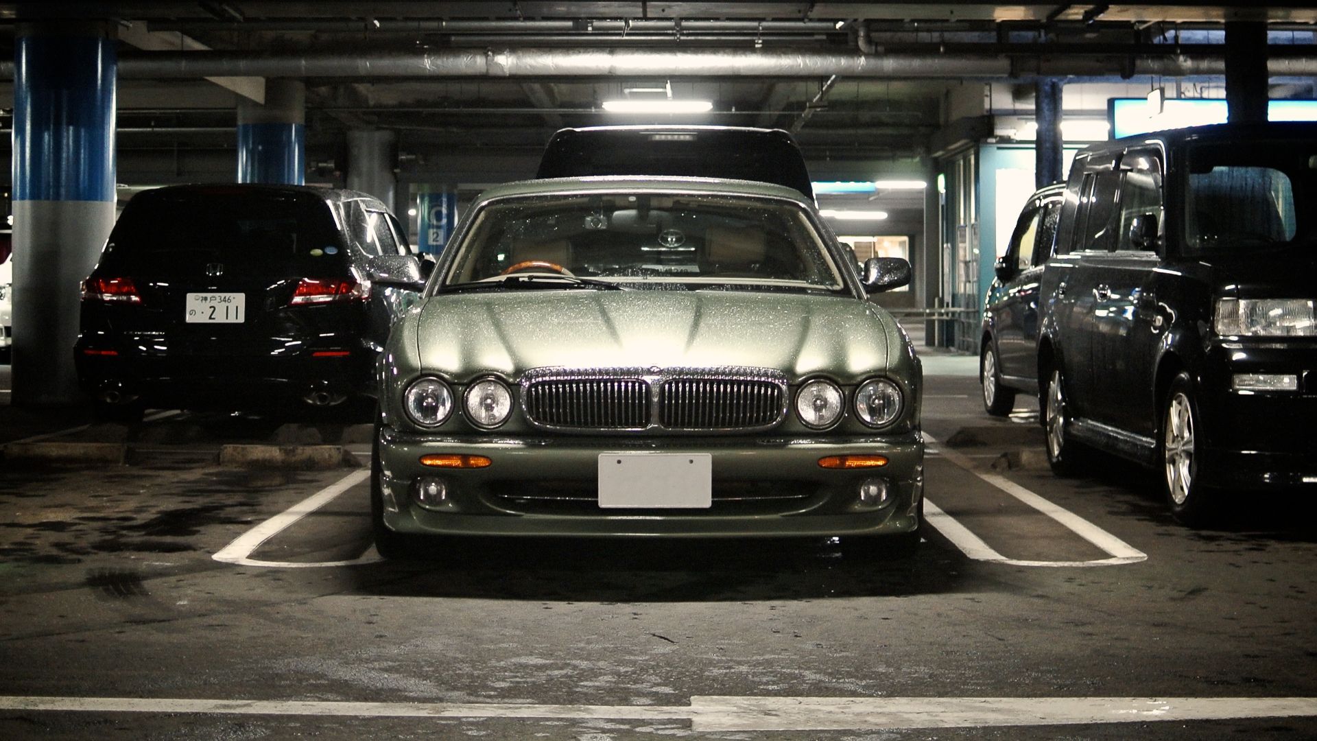 Old Jaguar car in underground parking