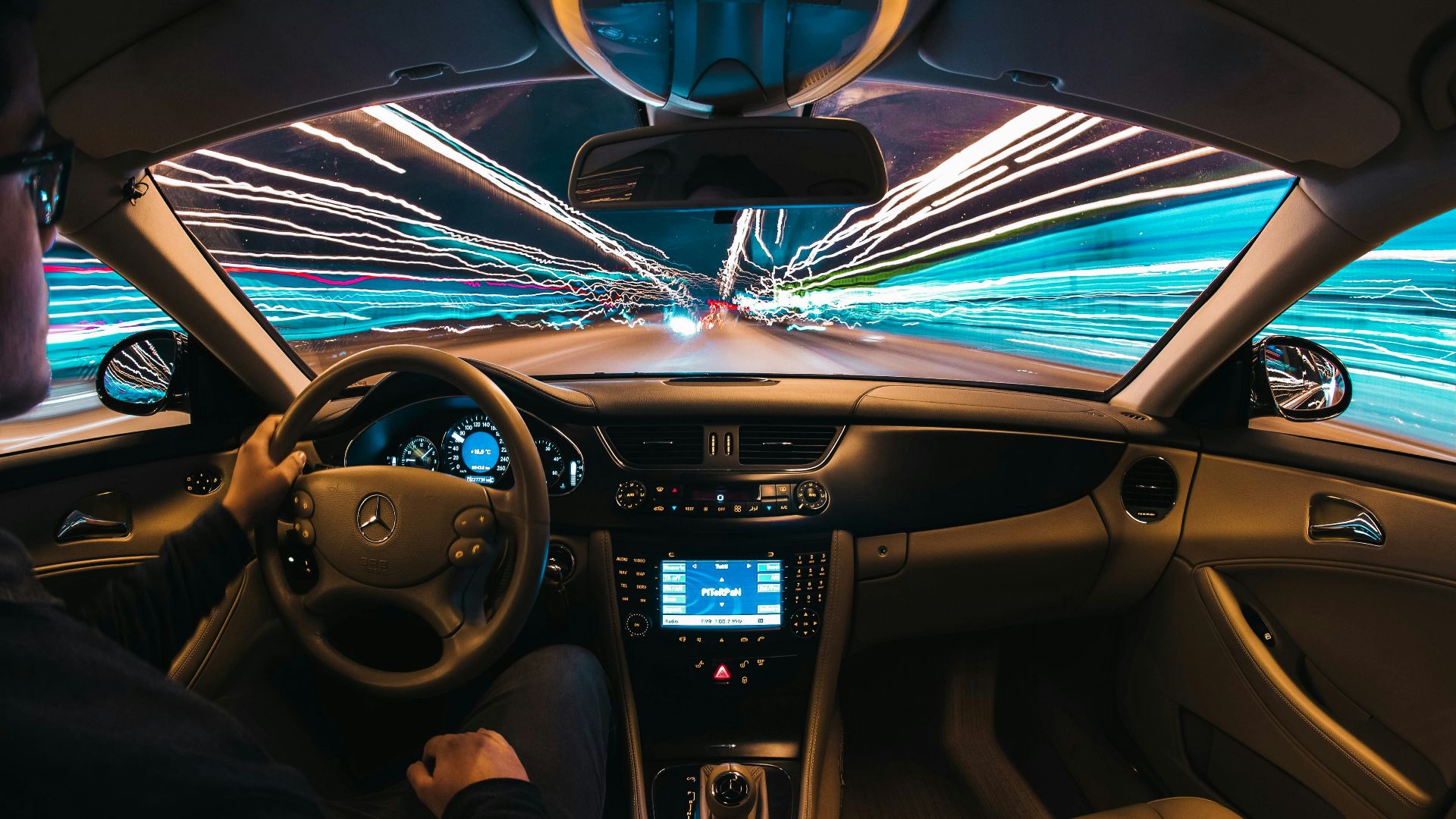 time lapse photography of man riding car