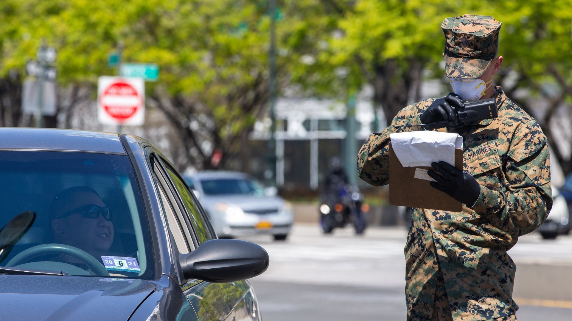 Lance Cpl. Wayne Parsons, a rifleman with Lima Company, 3rd Battalion, 2nd Marines, Task Force New York, radios in while providing security for the USNS Comfort (T-AH 20) during COVID-19 relief efforts in New York City, April 19, 2020. Comfort cares for t