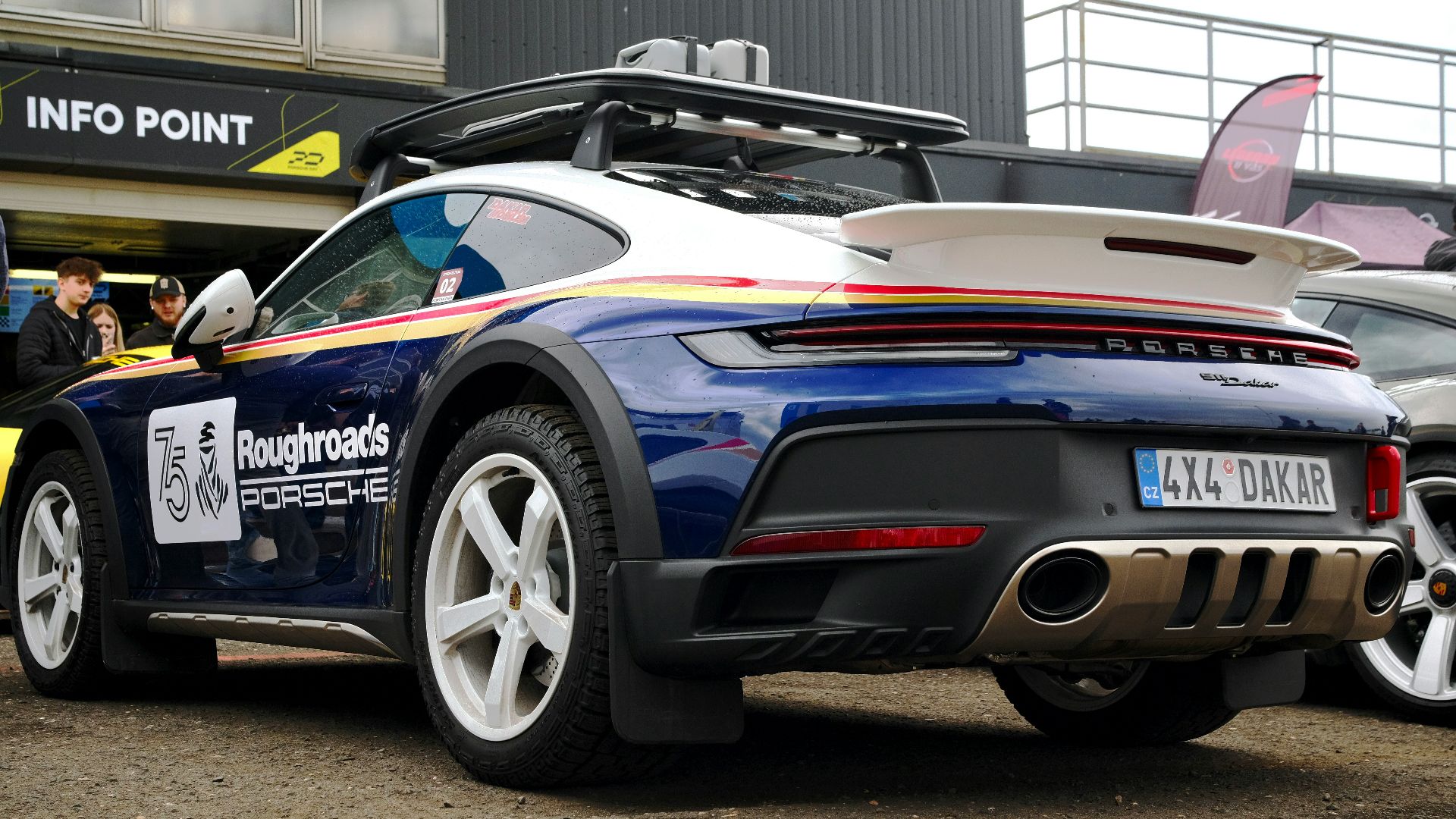 Blue porsche 911 dakar with roof rack