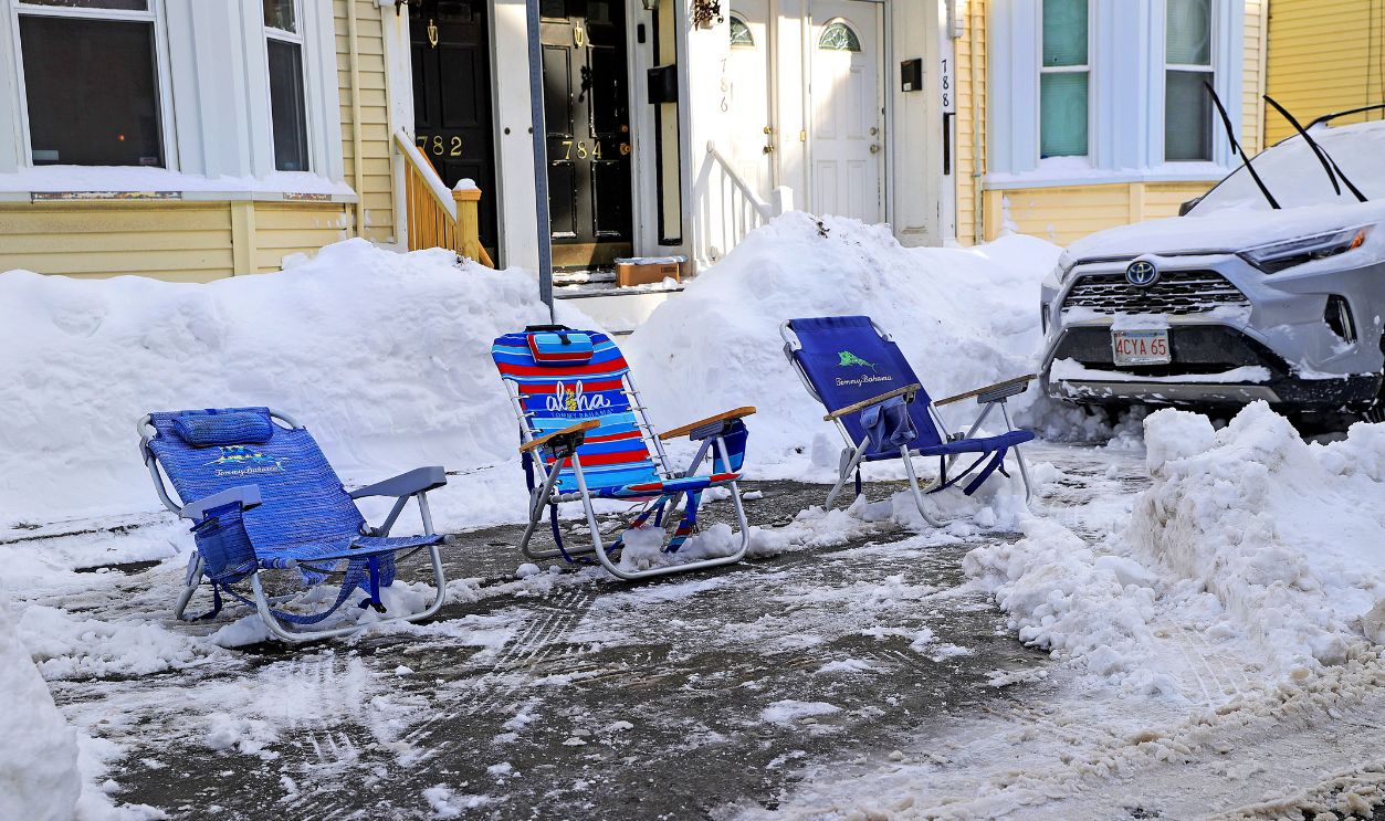Getty Images - 2258063120 - Beach chairs are used to save parking spots on E Third Street on January 27, 2026.