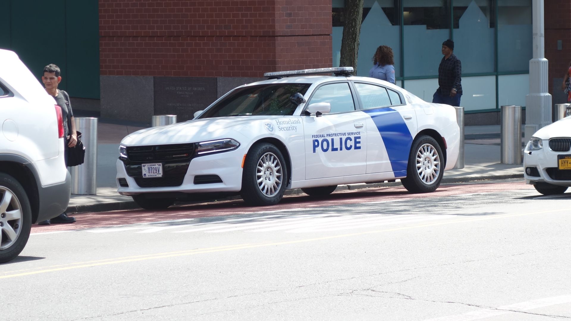 A Dodge Charger of the Federal Protective Service Police parked in front of the Joseph P. Addabbo Federal building at Jamaica Avenue and Parsons Boulevard in Jamaica Center, Queens.