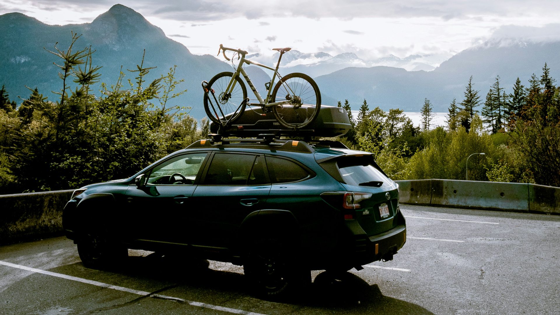 a car with bicycles on top of it