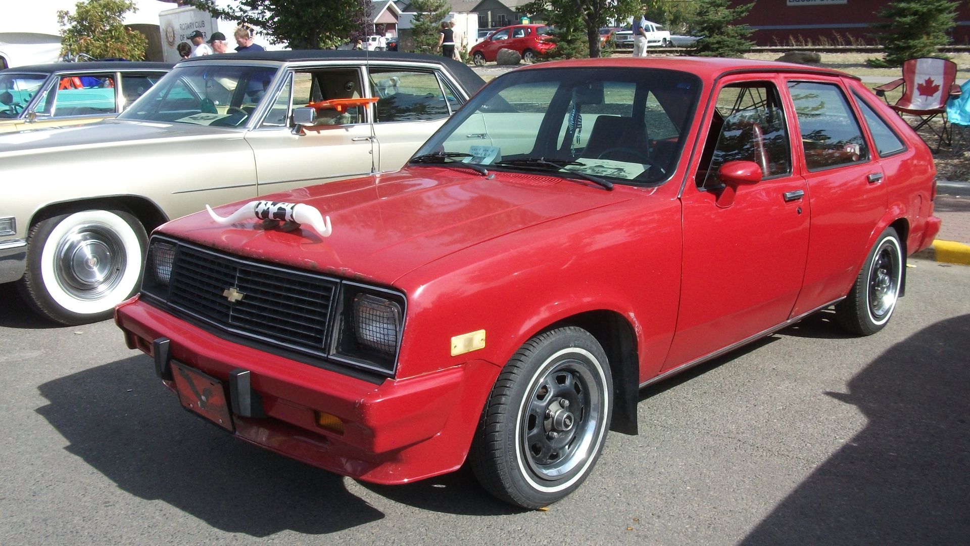 A late Chevrolet Chevette four door at the car show? This one was at least in nice shape and had some classy bull horns on the hood.
