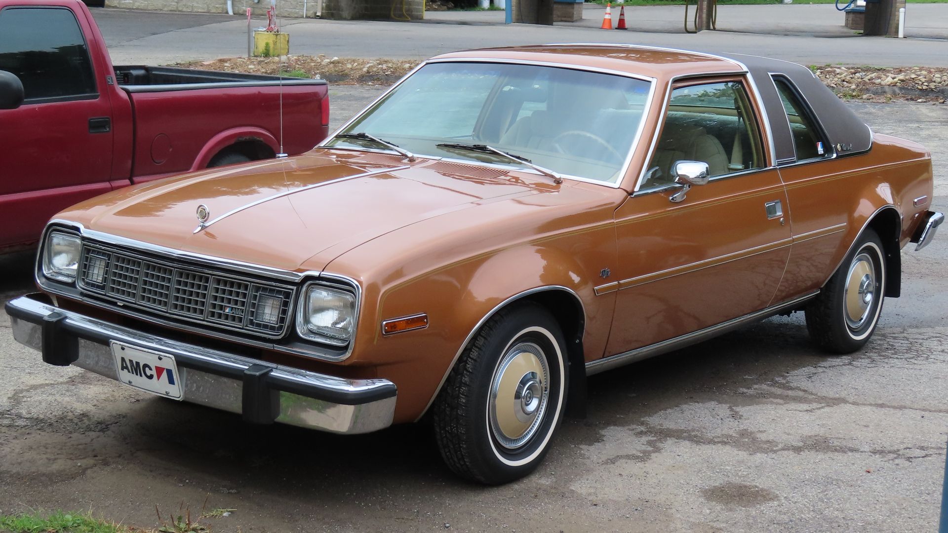 1978 AMC Concord D/L 2-door Sedan photographed in New Castle, Pennsylvania. This one is finished in Golden Ginger and looks to be in nearly pristine shape; I knew I had to pull over for pictures as soon as I saw it from the road.