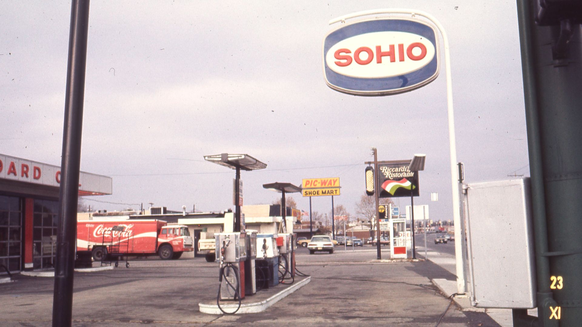 A view looking north on Cleveland Avenue from Oakland Park Avenue at the Cleveland and Oakland Park Sohio (Standard Oil of Ohio) Service station, 3129 Cleveland Avenue. Also featured are signs for Riccardi's Restaurant, 3149 Cleveland Avenue, and Pic-Way 