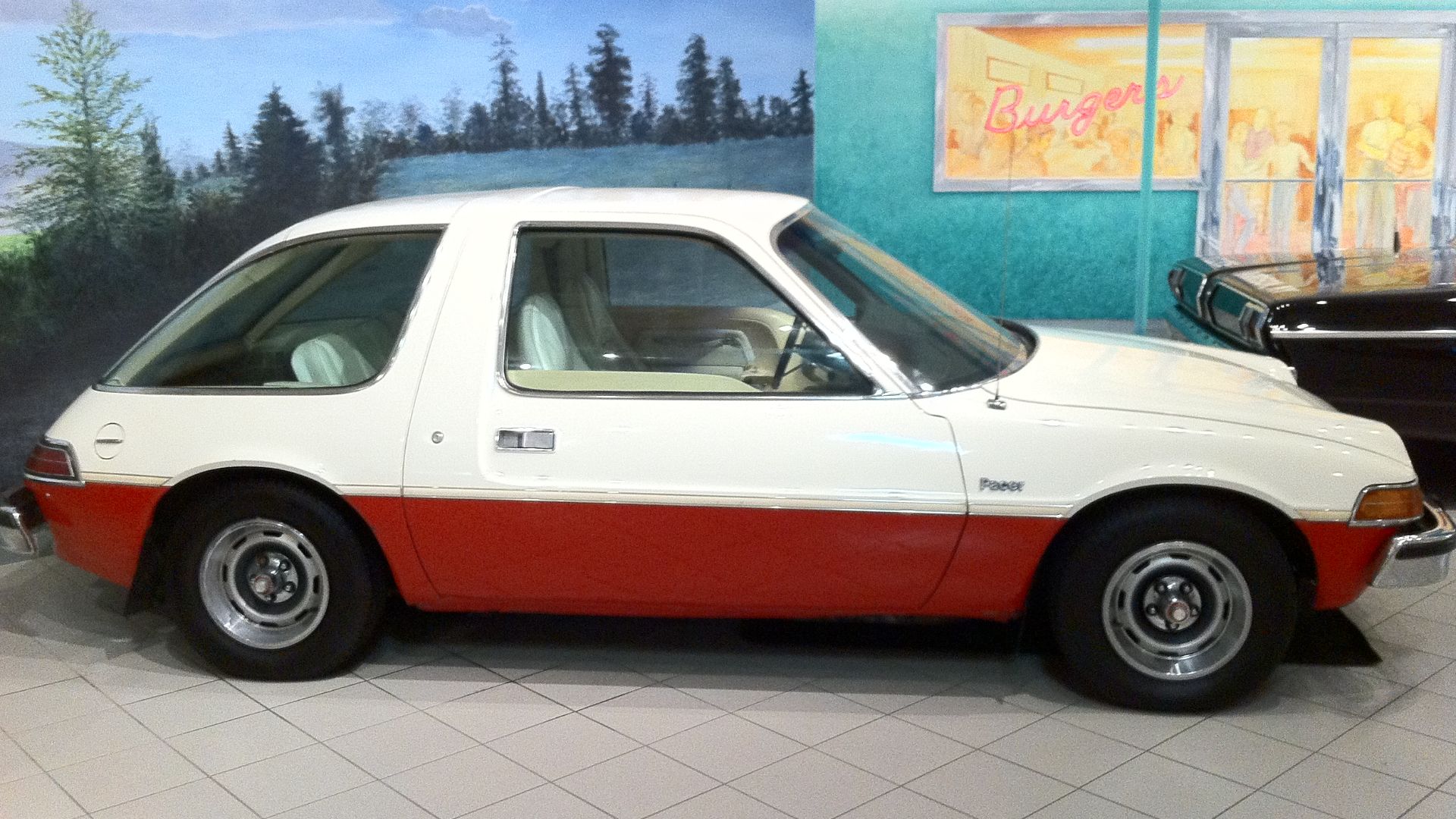 1975 AMC Pacer X coupe, by American Motors Corporation. Right side profile.  One of the cars in the permanent collection at the Antique Automobile Club of America Museum, located in Hershey, Pennsylvania. The AACA is the premier car club in the world focu