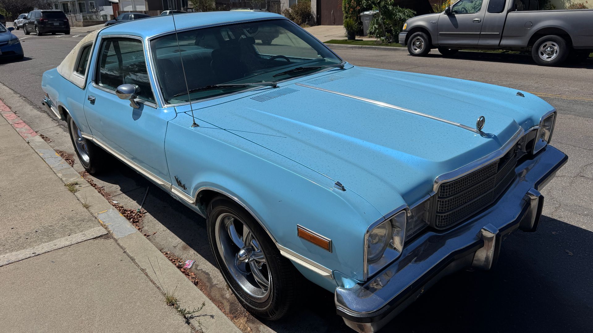 A baby blue classic 1976 Plymouth Volaré parked on the streets of San Diego, California - U.S.A.