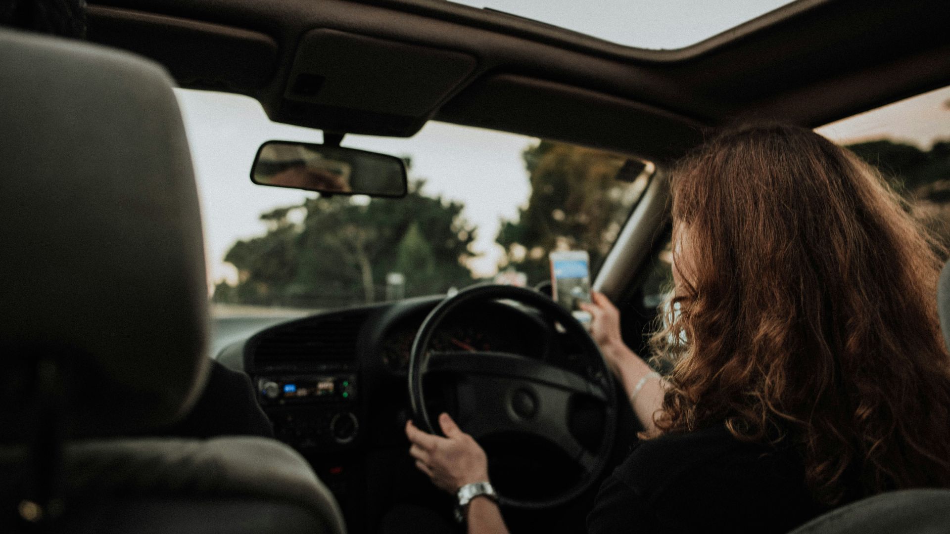 woman inside car driving