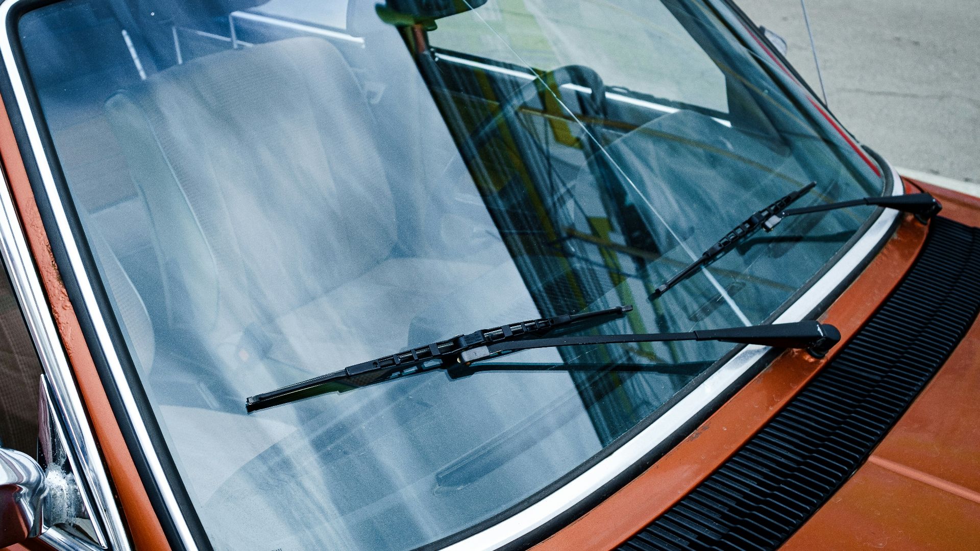 black car door with white window blinds